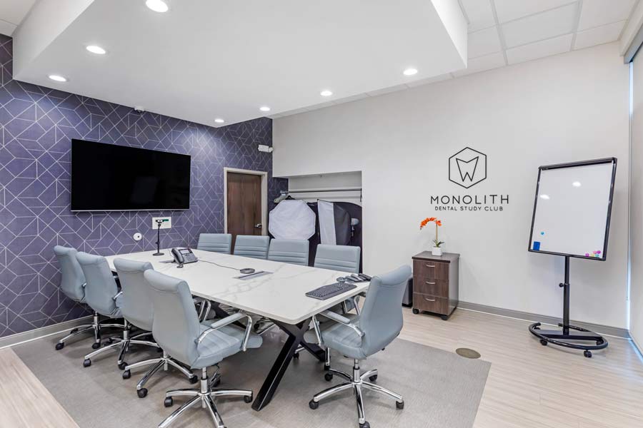Conference room with Monolith Dental Study Club sign at Glen Perio in Glenview, IL